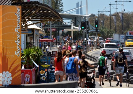 SURFERS PARADISE - NOV 14 2014:Visitors in Cavill Avenue Surfers Paradise CBD at night.It\'s Australia\'s iconic coastal tourist destinations drawing 10 million tourists a year from all over the world.