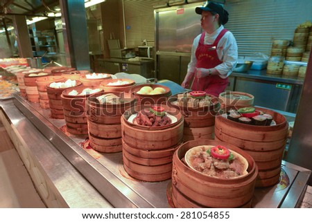 SHANGHAI - MAR 15 2015:Chinese food on display in a food market in Shanghai China.Chinese cuisine go back for thousands of years, changed according to climate, imperial fashions and local preferences.