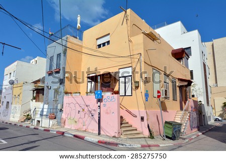 TEL AVIV - APR 13 2015:Old buildings in Neve Tzedek neighbourhood in Tel Aviv, Israel.It was established in 1887, 22 years before the 1909 founding of Tel Aviv City, by a group of Jewish families