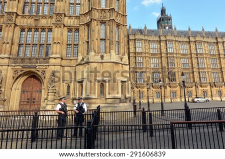 LONDON - MAY 14 2015:Security at Palace of Westminster in London, England UK.It\'s the meeting place of the House of Commons and House of Lords, the two houses of the Parliament of the United Kingdom.