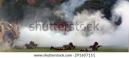 LONDON - MAY 14 2015:British Army force during military demonstration show.On 1 Jan 2015, the British Army employed: 87,140 Regulars, 2,720 Gurkhas and 25,010 Army Reservists to a combined force.