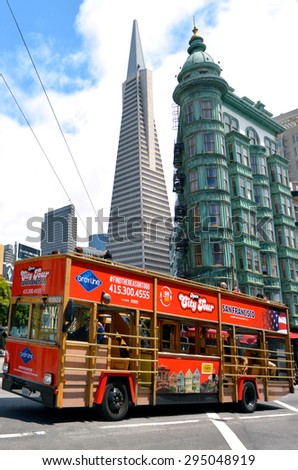 SAN FRANCISCO - MAY 19 2015:Tour bus in San Francisco financial district, CA.The tourism industry generate $500M in taxes for the City as visitor spending over $20 million a day.
