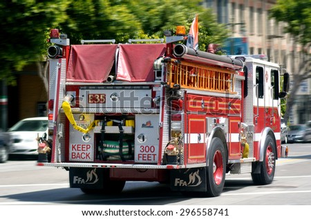 SAN FRANCISCO - MAY 21 2015:SFFD Truck E35 operating at a fire in the Tenderloin.San Francisco Fire Department serves an estimated population of 1.4 million people in the 47.5 square miles (123 km2)