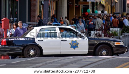 SAN FRANCISCO - MAY 17 2015:Modern SFPD cruiser in Powell St. San Francisco California.According to  San Francisco Police records, thefts and robberies crime is at high since 2008.