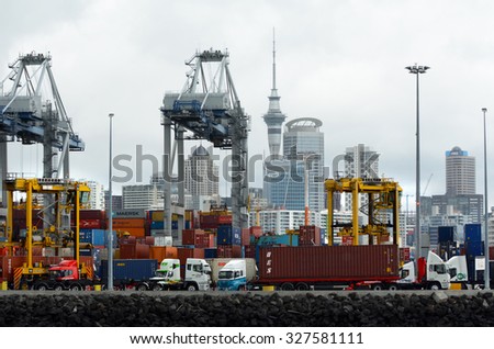 AUCKLAND,  NZL -OCT 13 2015:Big cargo ship unloading containers in Ports of Auckland New Zealand.ItÃ¢??s New Zealand\'s busiest port and the third largest container terminal in Australasia.