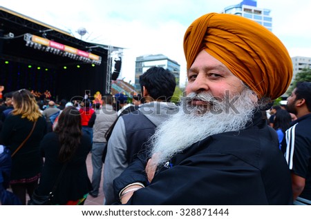 AUCKLAND,  NZL - OCT 18 2015:Mature Indian man celebrating Diwali festival in Auckland,New Zealand.It\'s the most ancient and biggest Hindu festival in India celebrated in autumn every year