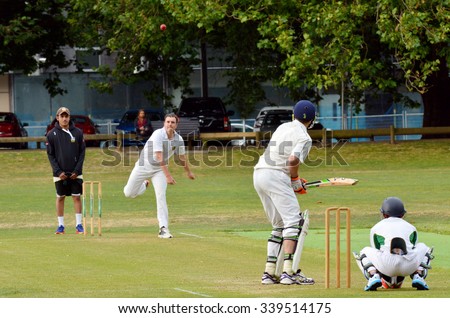 AUCKLAND - NOV 14 2015:Cricket bowler bowling to a batsman..It\'s one of New Zealand most popular national sport and the first recorded game took place in Wellington in December 1842.