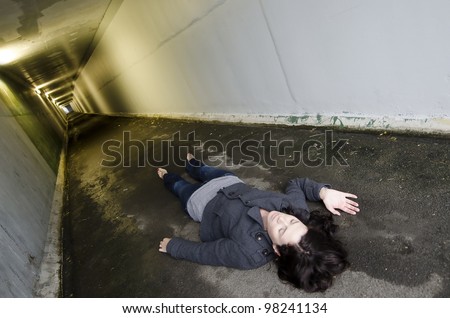Crime scene concept photo of a murder victim woman lying dead on the ...