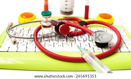 M?edicine, phonendoscope, bottle, the keyboard, ball pens syringe, needle, injection on a white background