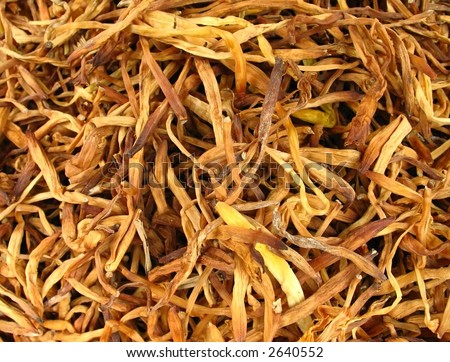 stock photo : Dried lily buds, golden needles, from Chinese herbal shop.