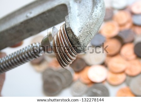Iron working tool with a tight grip on currency coins (concept, grip on money)