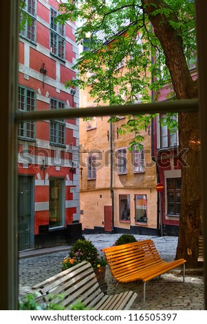 View from the window a small cafe on the patio in the old town. Stockholm. Sweden