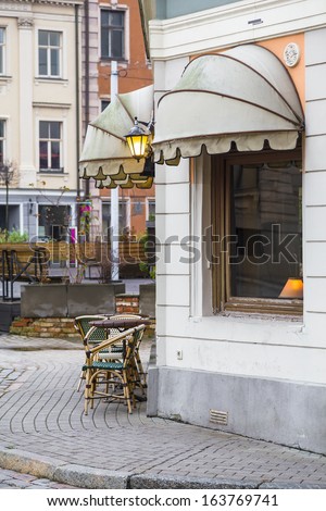 A small cozy cafe on the corner of the street. Riga. Latvia