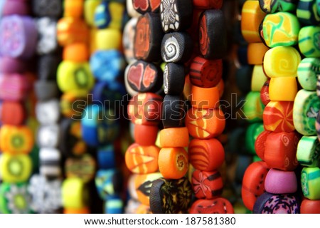 Many colorful hipster beads on a souvenir market