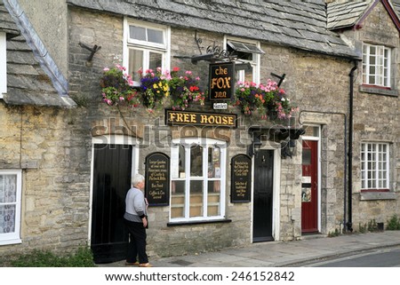 CORFE CASTLE UK-OCTOBER 2014.The very small Fox Inn said to be the oldest pub in Corfe castle.