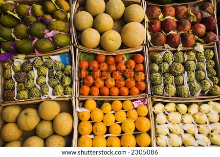 Different fruits in boxes on a counter of street shop in Egypt