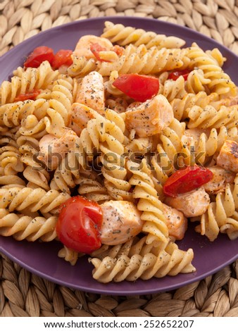 Whole wheat pasta with cherry tomatos and salmon