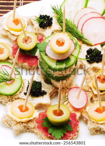 Appetizers - small bites of bread and vegetables
