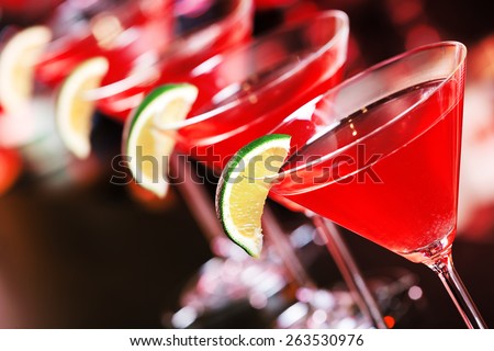 Cosmopolitan cocktail  on a bar counter in a nightclub