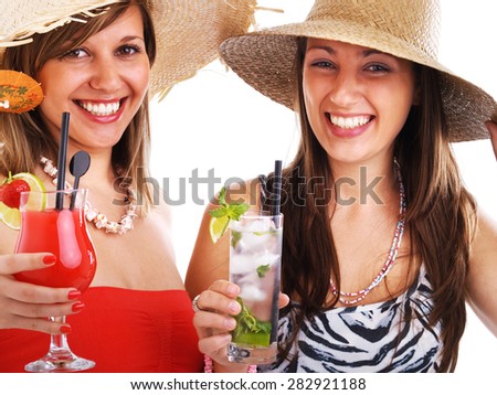 Women with hats drinking cocktails on white background