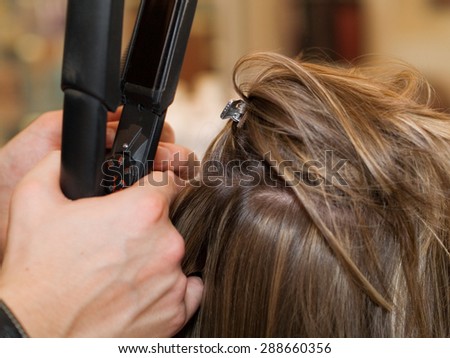Using hair straightener