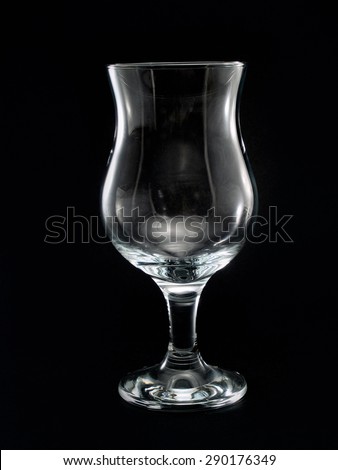 Empty Hurricane Glass isolated on black background