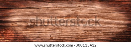 Old rich brown wood grain texture background (fragment)