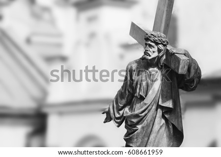 the crucifixion of Jesus Christ as a symbol of God\'s love (antique statue)