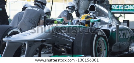 JEREZ, SPAIN - FEBRUARY 11: Lewis Hamilton practicing PitStops with his new Mercedes team on the first Test at the Jerez Circuit in Jerez, Andalucia, Spain on Feb. 11, 2013.