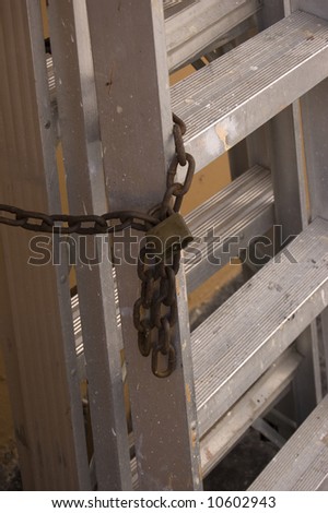 Lock on a ladder outside a building