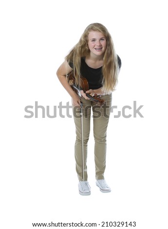 Full body front view, looking forward, of pretty young teenage girl taking a bow after playing the violin isolated on white