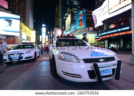 NEW YORK CITY - MAY 6: NYPD police car in Times Square at night, Manhattan on May 6th, 2013 in New York City, USA