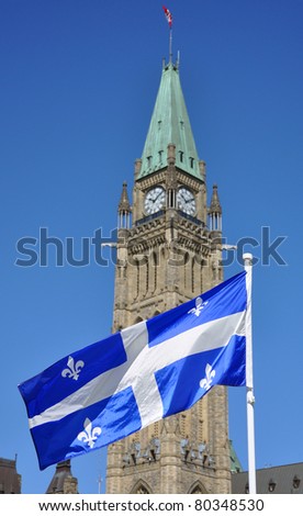 Quebec Flag with Bourbon Lilies flying in front of Peace Tower, Parliament Hill, Ottawa, Canada