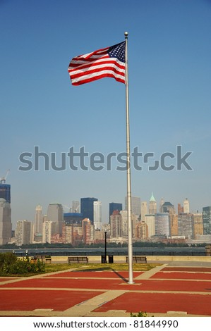 National Flag of United States, with Manhattan skyline in the background, Liberty State Park, New Jersey, USA
