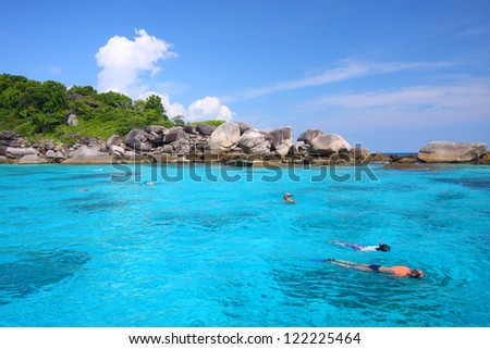 Tourists snorkling at Similan sea, Great for discover plenty of fishes and corals.