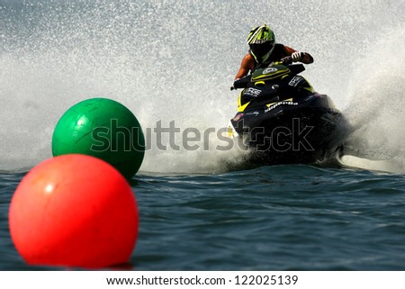 PATTAYA, THAILAND - DECEMBER 7 : Unidentified driver in the race of Jet Ski World Cup Grandprix 2012 on December 07, 2012 in Jomthein beach Pattaya, Thailand