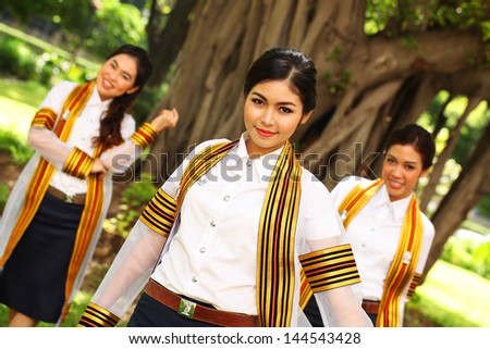 Group of Asian graduate girls happily and cheerful on graduation day.