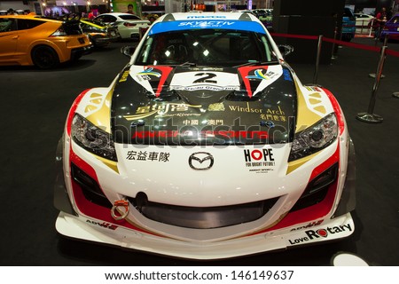 NONTHABURI THAILAND-JUNE 20 : Mazda RX8 modified and displayed at Bangkok International Auto Salon 2013 on June 20, 2013. The event exiting modified car showed in Nonthaburi, Thailand.