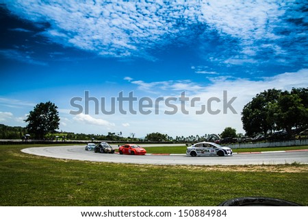 PATTYA, THAILAND-AUG.18 : Group of racing cars in Super 2000 series during the Thailand Super Series Round 3-4 at Bira International Circuit on August 18, 2013 in Pattaya, Thailand