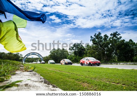 PATTYA, THAILAND-AUG.18 : Group of racing cars in Super Production series during the Thailand Super Series Round 3-4 at Bira International Circuit on August 18, 2013 in Pattaya, Thailand