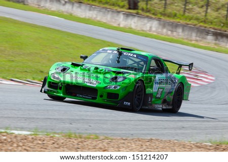 PATTYA, THAILAND-AUG.17 : Thanapol T drives Mazda (17) in Super car class 2 R 3 during the Thailand Super Series 2013 Round 3-4 at Bira International Circuit on August 17, 2013 in Pattaya, Thailand