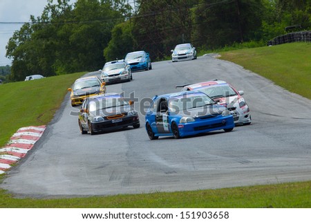 PATTYA, THAILAND-AUG.17 : Group of racing car in Super 1500  Round 3 during the Thailand Super Series 2013 Round 3-4 at Bira International Circuit on August 17, 2013 in Pattaya, Thailand