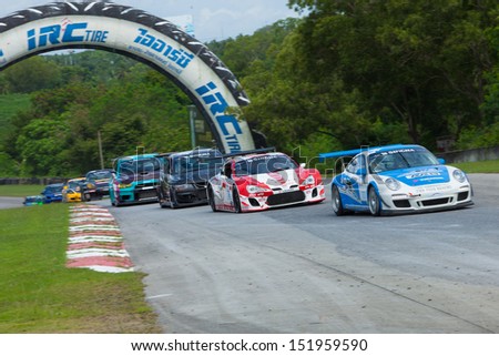 PATTYA, THAILAND-AUG.18 : Group of racing car in Super car class2 round 4 during the Thailand Super Series 2013 Round 3-4 at Bira International Circuit on August 18, 2013 in Pattaya, Thailand