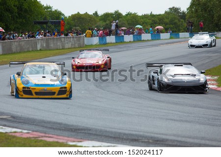PATTYA, THAILAND-AUG.18 : Group of racing car in Super car class1 round 4 during the Thailand Super Series 2013 Round 3-4 at Bira International Circuit on August 18, 2013 in Pattaya, Thailand.
