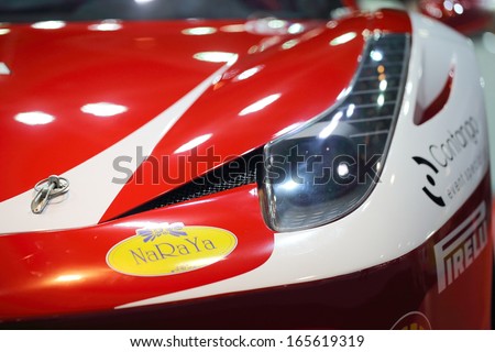 NONTHABURI - NOVEMBER 28: Detail of Ferrari 458 decoration and modify by Sngha Team display on stage at The 30th Thailand International Motor Expo on November 28, 2013 in Nonthaburi, Thailand.
