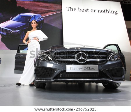 BANGKOK - DECEMBER 9 : Pretty models posted over Mercedes Benz The new C-Class displayed on stage in Motor Expo 2014, on dec. 9, 2014 in Bangkok, Thailand.