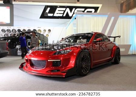 BANGKOK - DECEMBER 9 : Status of super sport car by Lenso wheel displayed on stage in Motor Expo 2014, on dec. 9, 2014 in Bangkok, Thailand.