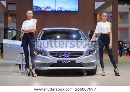 BANGKOK, THAILAND - MARCH 24 : Volvo V60 with super models displayed at the 36th Bangkok International Motor show  in March 24, 2015. Bangkok, Thailand.