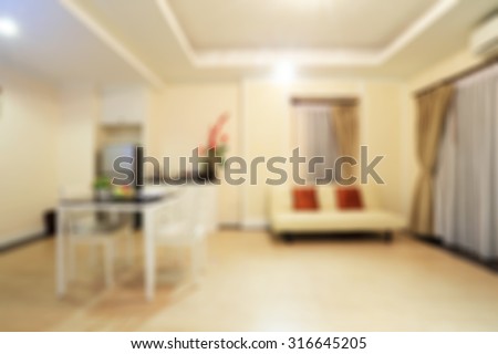 Abstract blur of living room and dining room in the hotel.