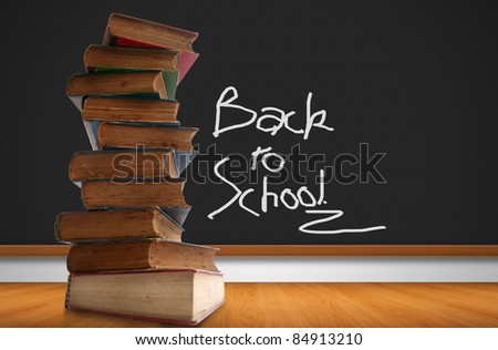 School books with hand write on the bord as background